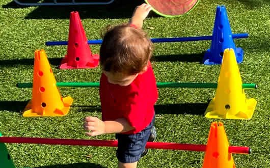 Gross motor activities support movement, balance, strength, and body awareness, forming the foundation for fine motor skills.